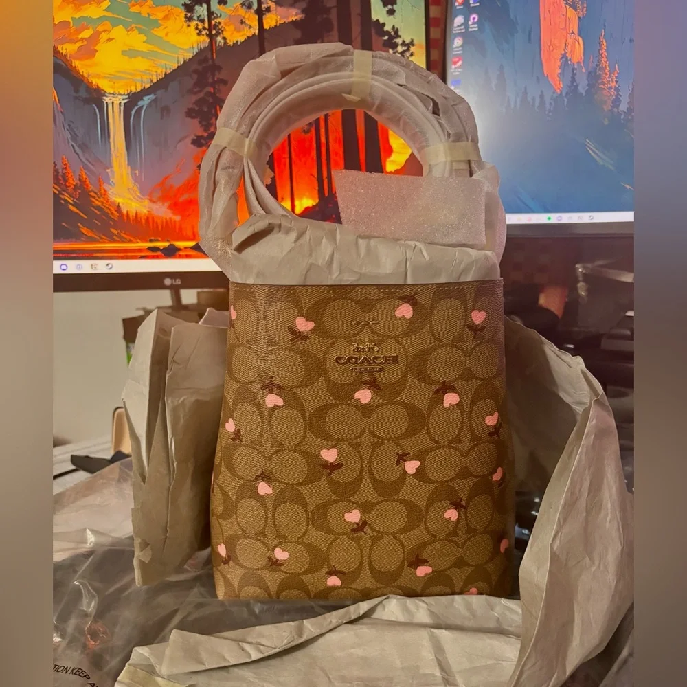 Coach Brown and Pink Crossbody Bag with Modern Elegance - Picture 2 of 4